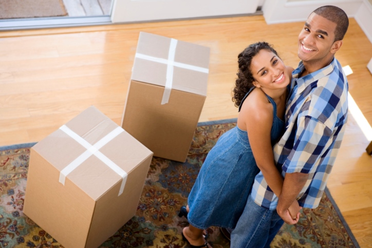 happy-couple-moving-into-a-new-home