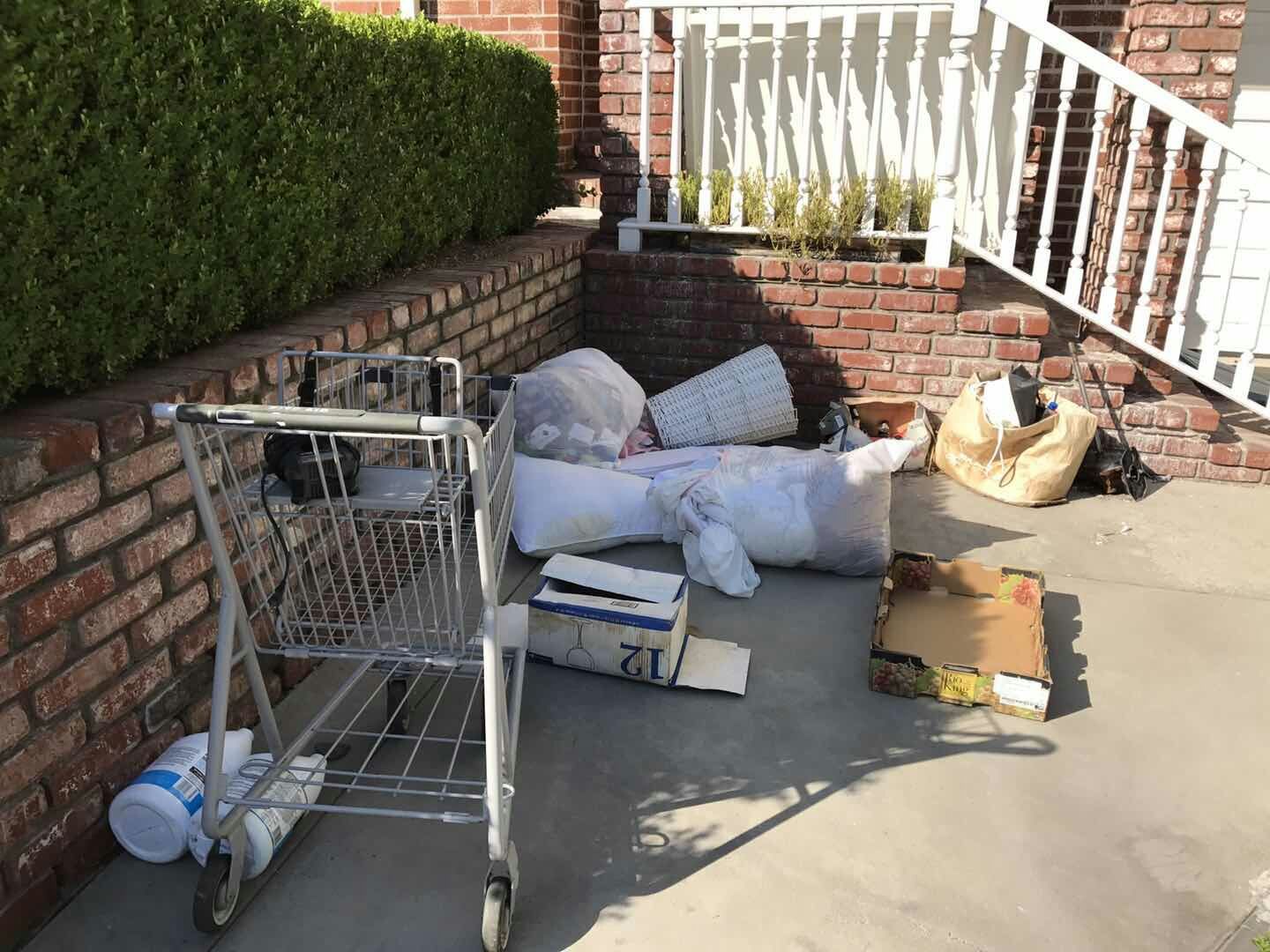 driveway-mess-from-bad-tenant-stolen-shopping-cart