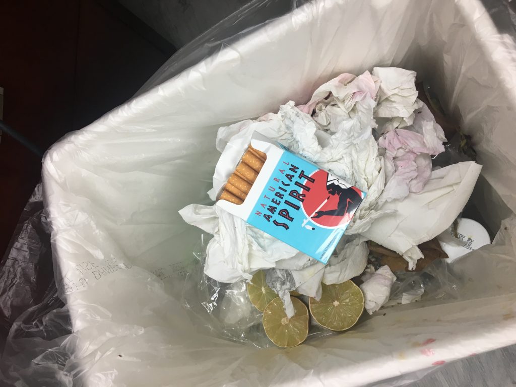 american-spirit-regular-light-blue-cigarettes-in-trash